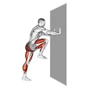 Hohes Knie gegen Wand